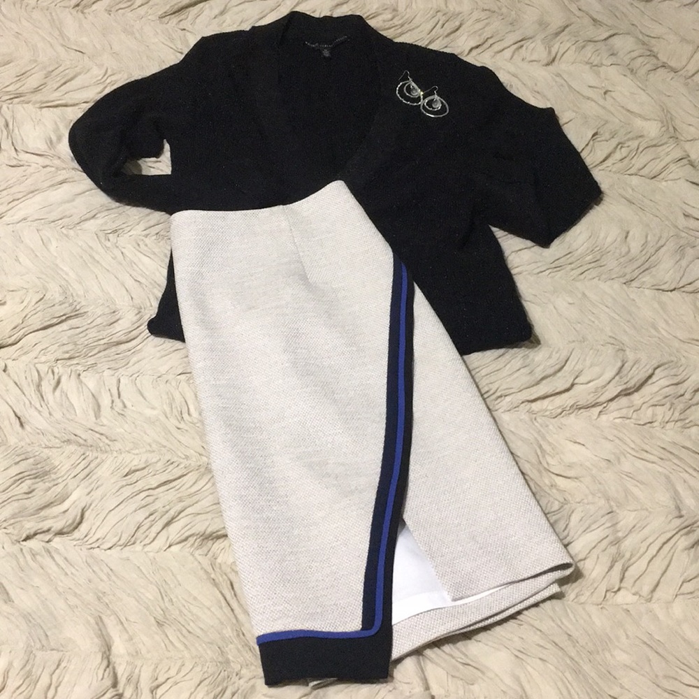 Wheat skirt with navy and black asymmetric detail.